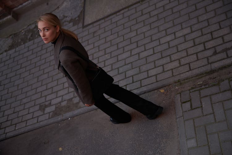 A Woman Walking On The Street