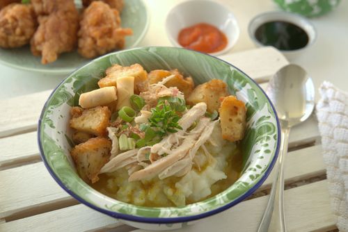 Free Close-up of a savory chicken soup bowl with croutons and herbs, ideal for a healthy meal. Stock Photo
