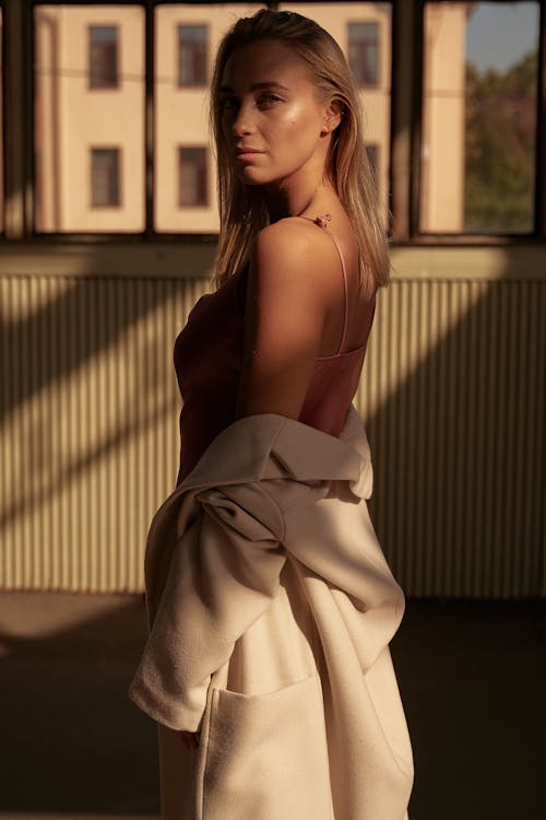 Photo of Woman wearing Beige Long Coat