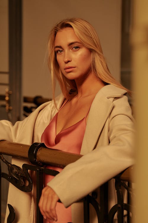 Beautiful Woman in Beige Blazer and Pink Silk Top 