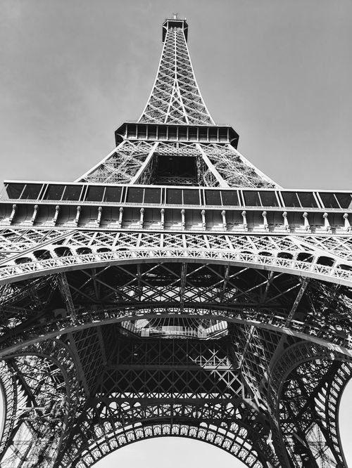 Free Striking low-angle shot of the Eiffel Tower in Paris, emphasizing its steel structure. Stock Photo