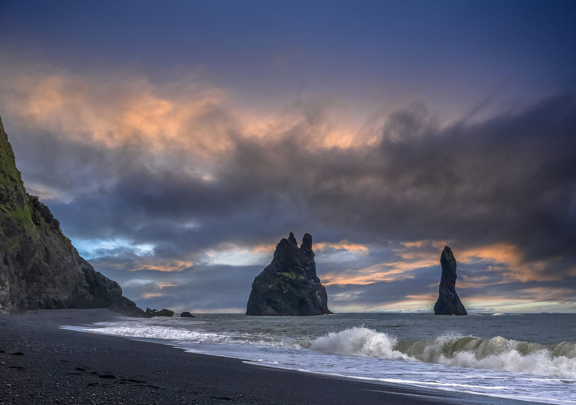 Reynisdrangar sea stacks off Reynisfjara black beach