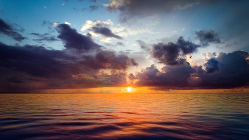 Безкоштовне стокове фото на тему «блакитне небо, вода, Захід сонця» стокове фото