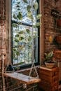 Swing with creeping plant in old house