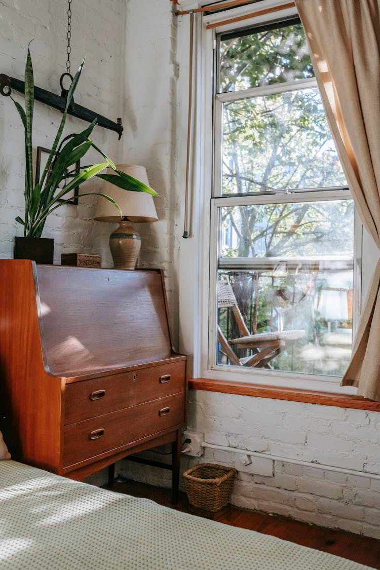 Cozy Room With Retro Cabinet Near Window