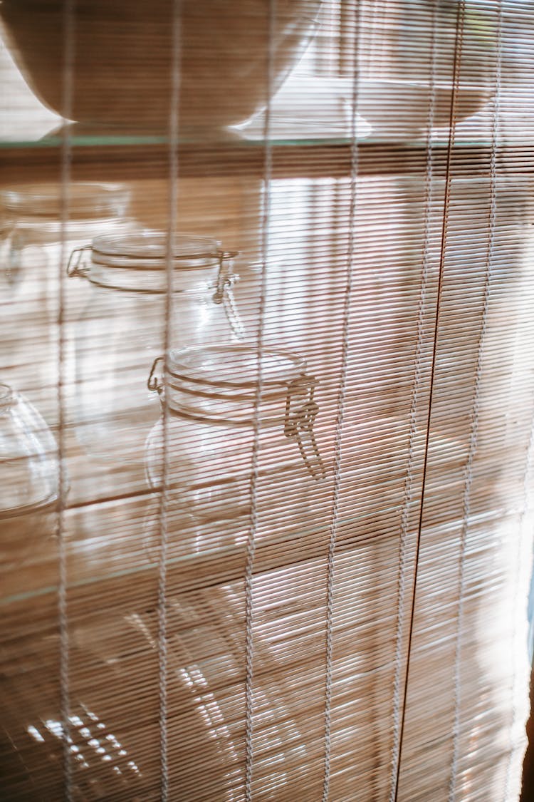 Glass Jars Placed On Shelf