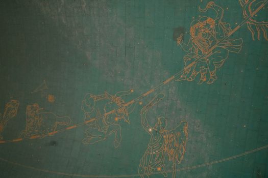 Illustration of zodiac signs on a historic astronomical ceiling, showcasing intricate details and vintage charm.