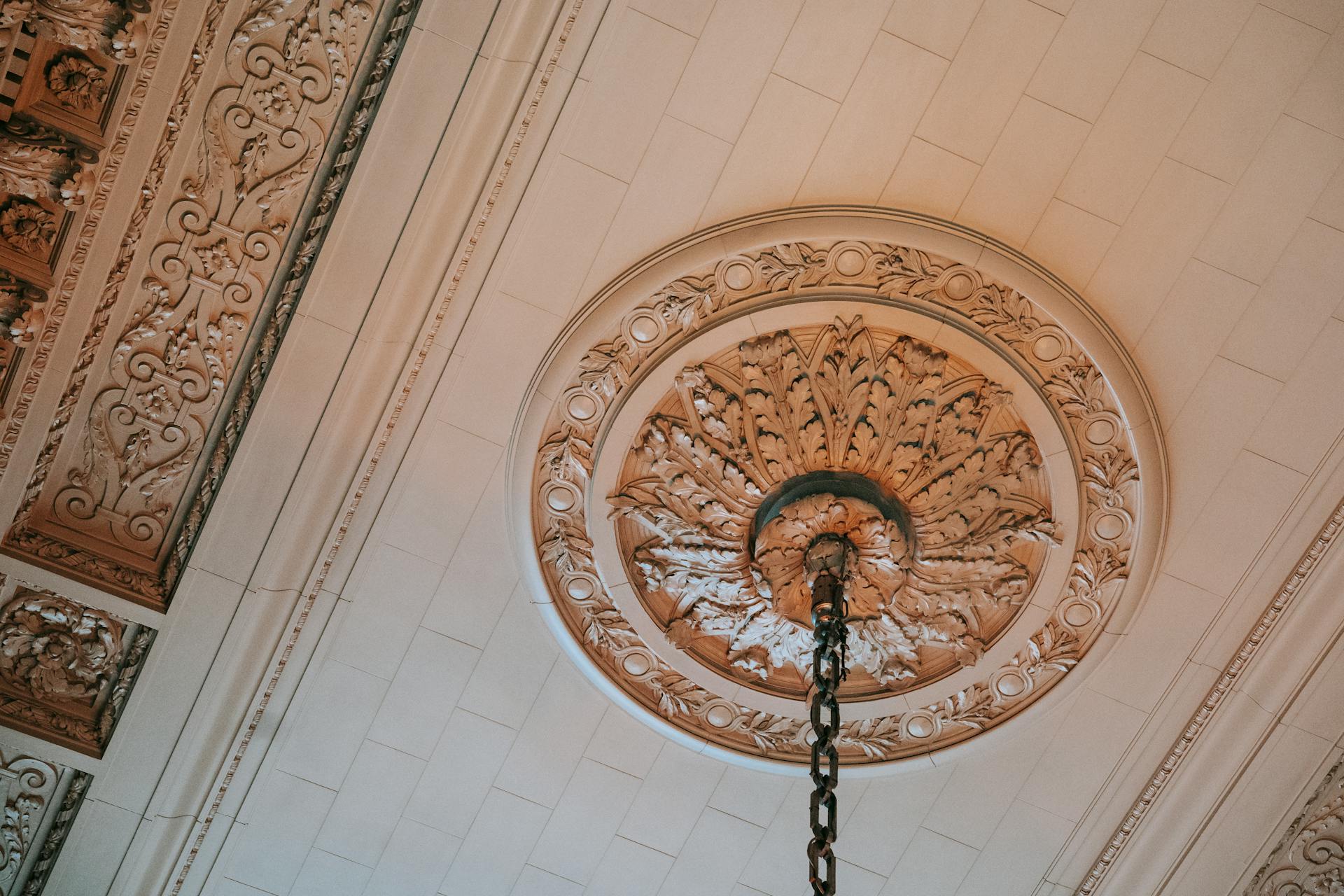 Ornamental ceiling and chandelier in museum