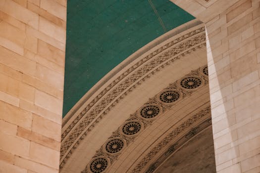 Close-up view of an ornate arch and ceiling design inside Grand Central Terminal, New York.