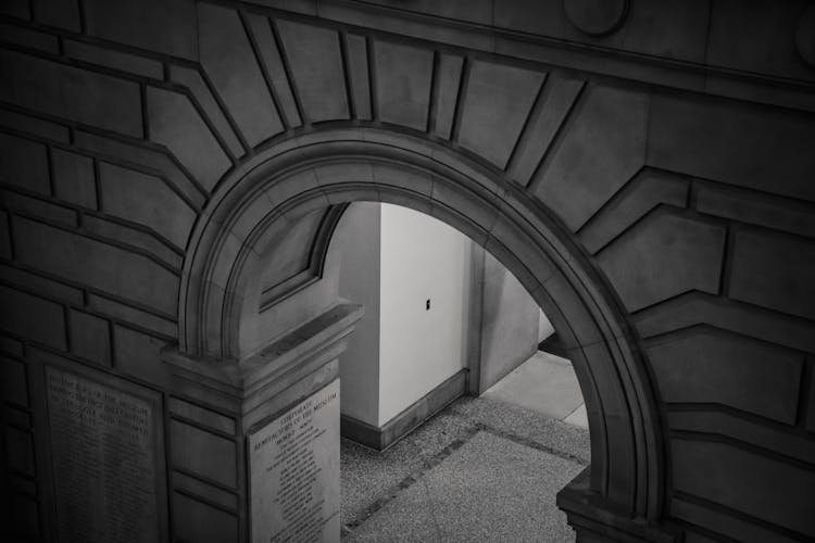 Old Masonry Building Interior With Arch Above Passage