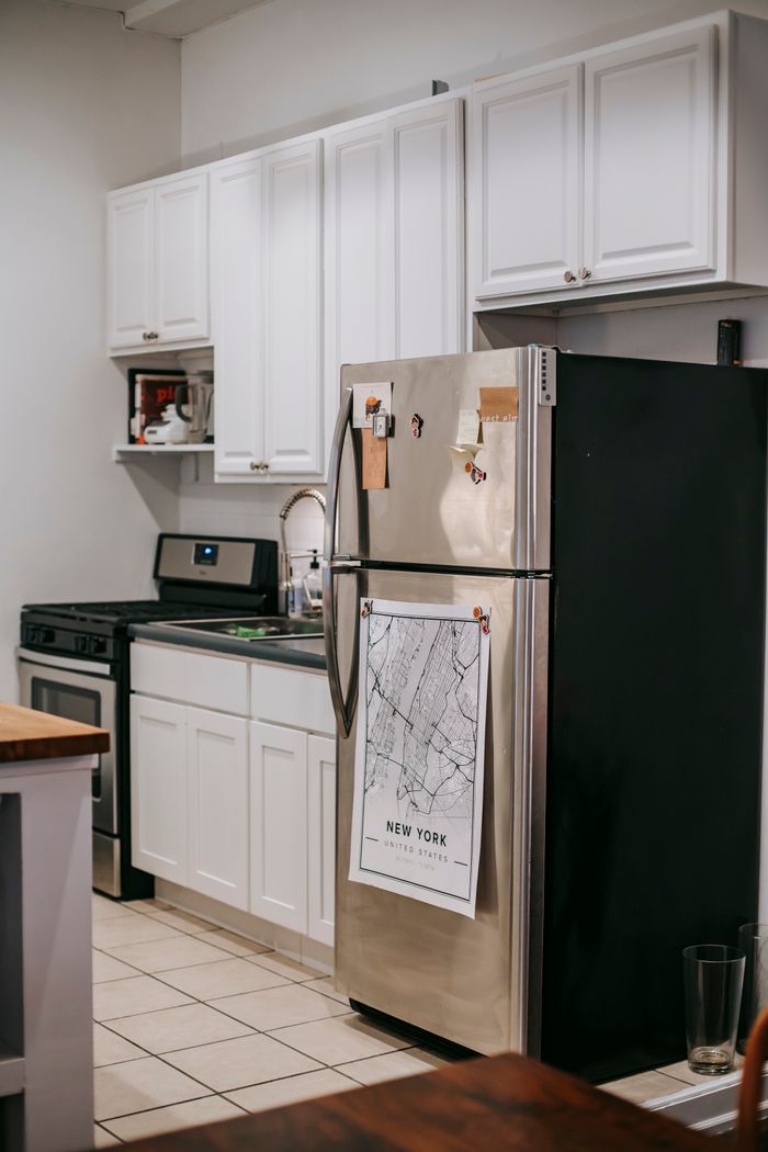 Stainless steel refrigeration unit in a modern kitchen