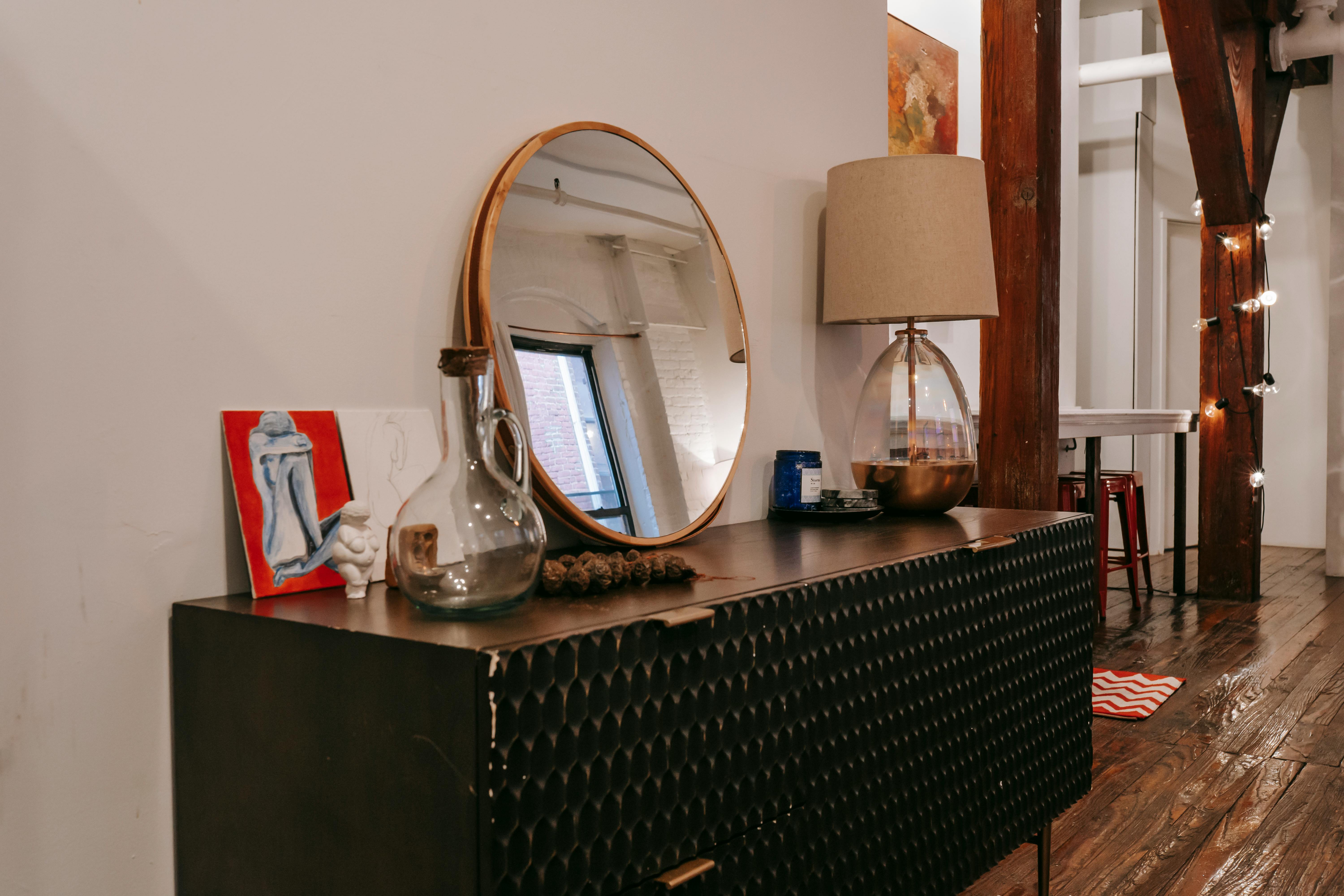 Black dresser with on sale mirror and lights