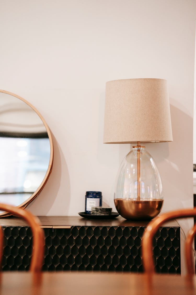 Room Interior With Lamp On Commode At Home