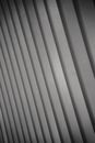 Textured backdrop of vertical beams in modern building