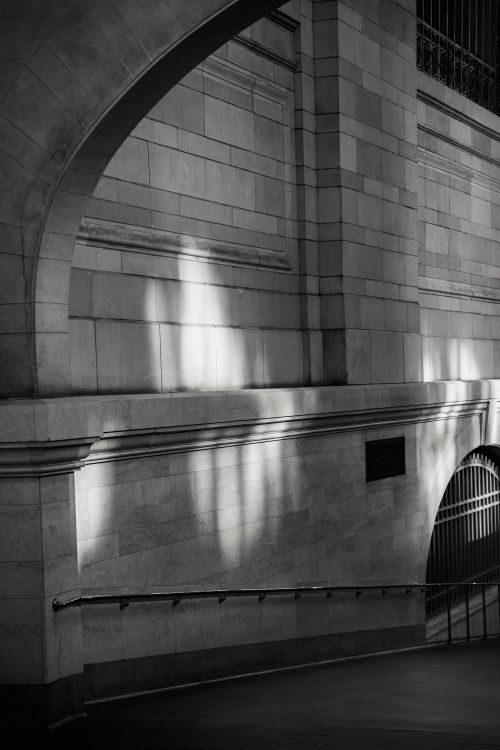 Free Black and white of aged famous passage with arched pillars and brick walls located in Grand Central Terminal New York USA Stock Photo