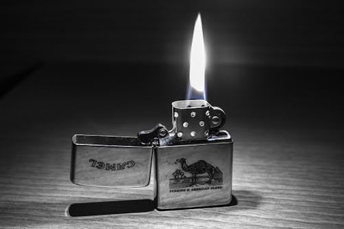Free Grayscale Photography of Camel Flip Lighter Stock Photo