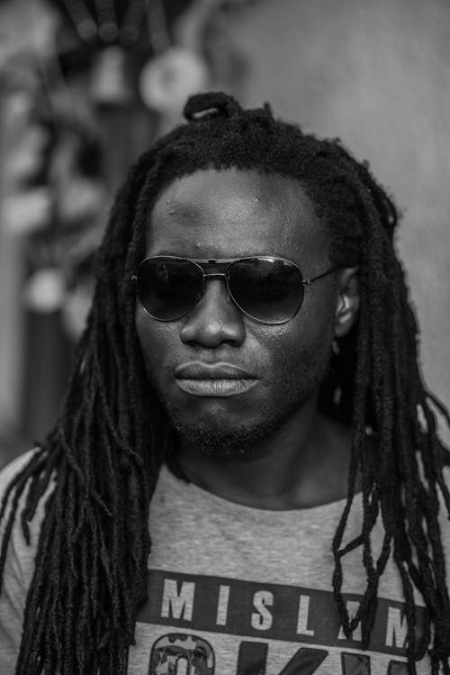 Foto profissional grátis de dreadlocks, homem africano, óculos