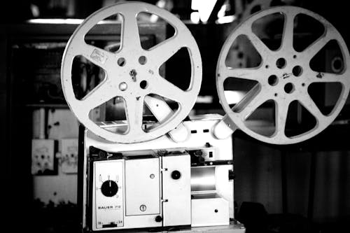 Grayscale Photo of Film Reels