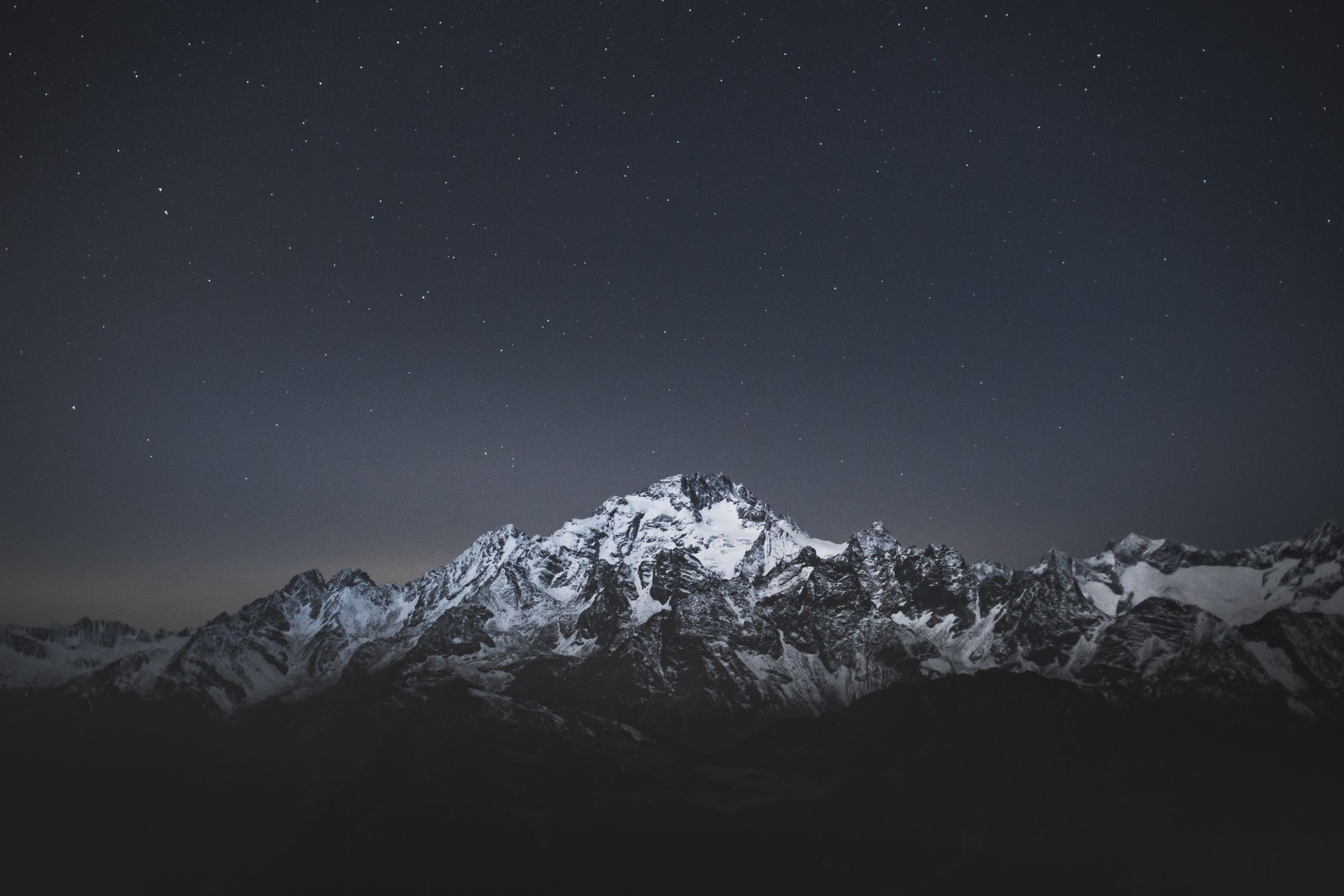Snow Covered Mountain Under Starry Sky during Night Time · Free Stock Photo