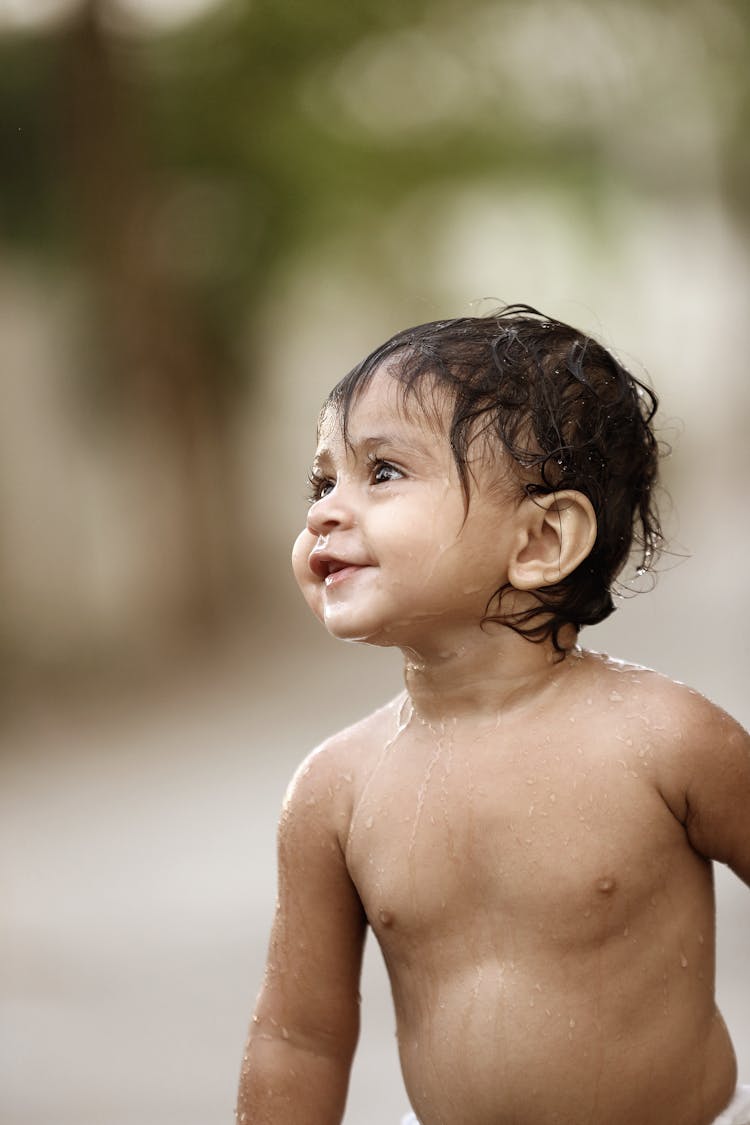 Portrait Of Cute Shirtless Boy