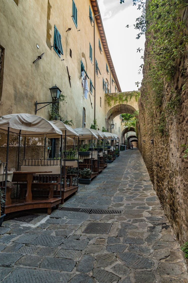 Outdoor Cafe Tables On Narrow Street