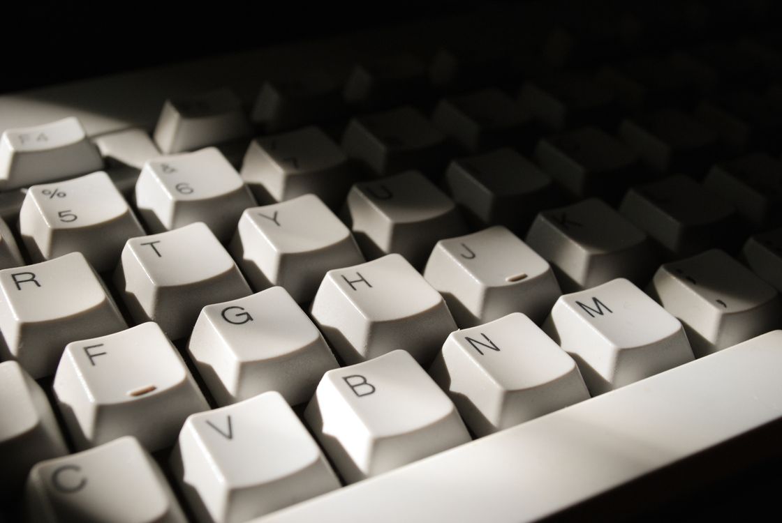Close-Up Shot of a Computer Keyboard · Free Stock Photo