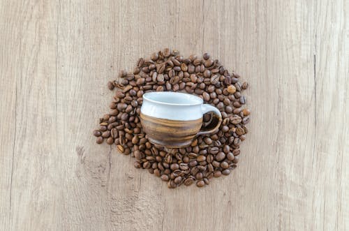 Free Brown Mug on Brown Coffee Beans Stock Photo