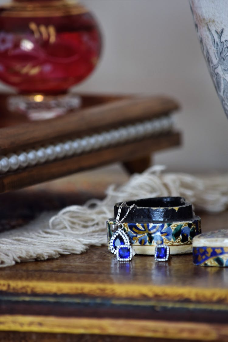 Earrings Beside A Jewelry Box