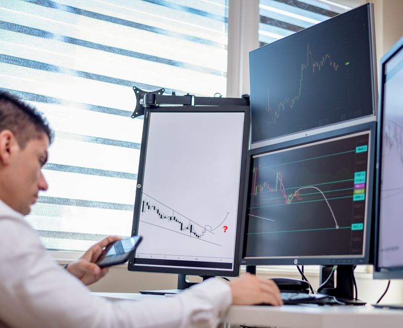 A trader analyzing historical data on trading strategies