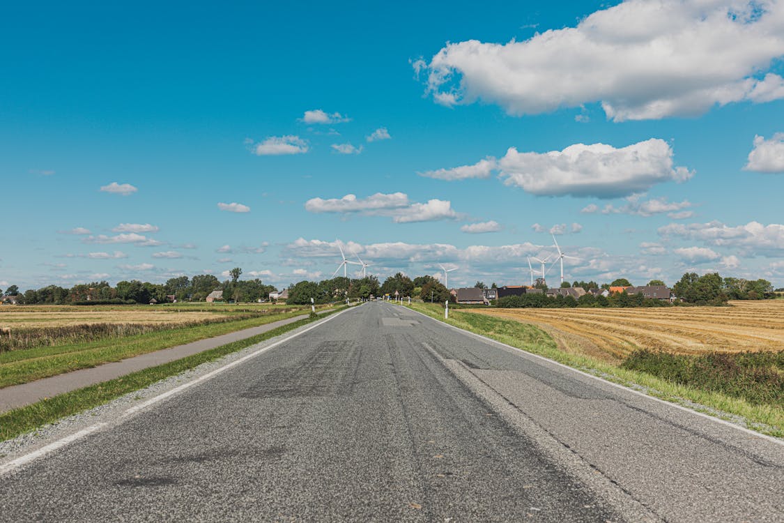 Free Road near Agricultural Land Stock Photo
