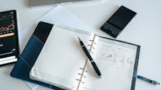 A Pen on an Open Notebook