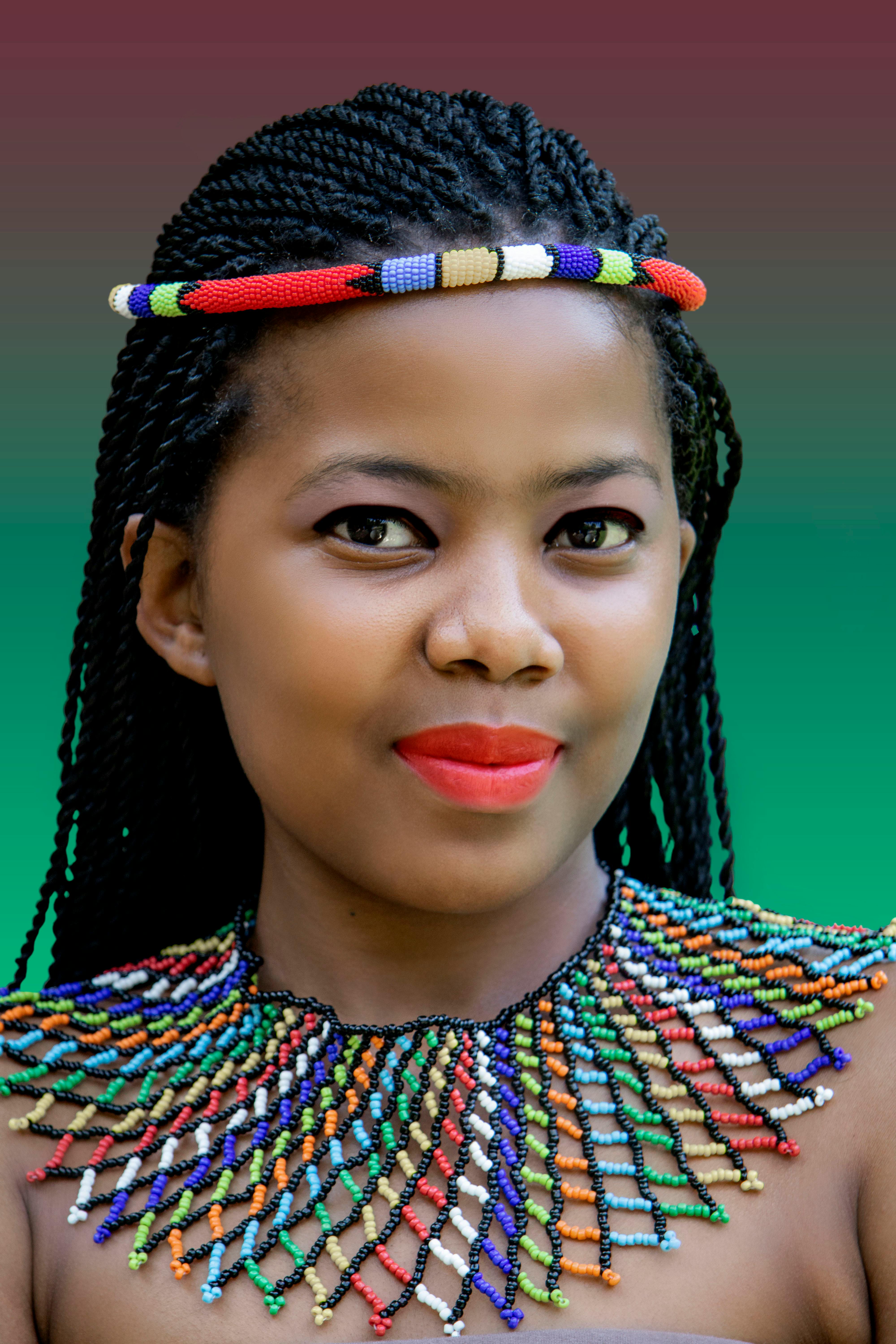 Young Model Wearing Ethiopian Dress and Beaded Necklace · Free Stock Photo