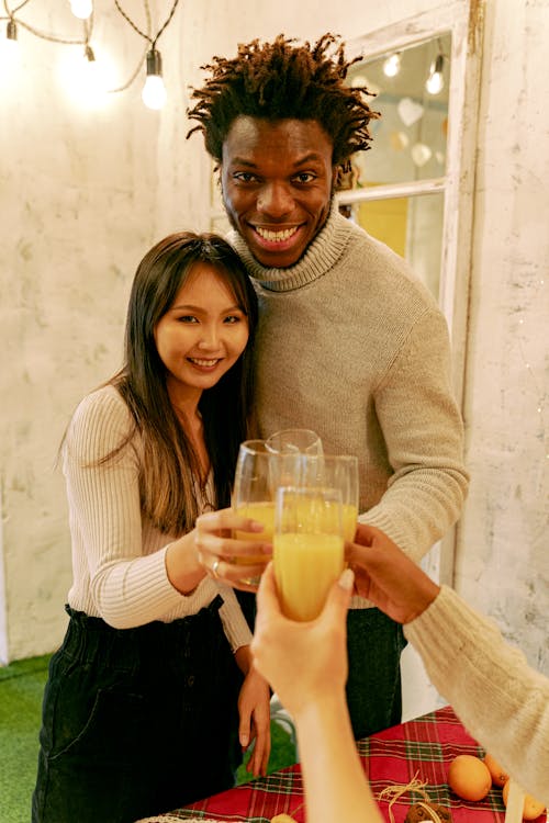 A Man and Woman Cheers Together