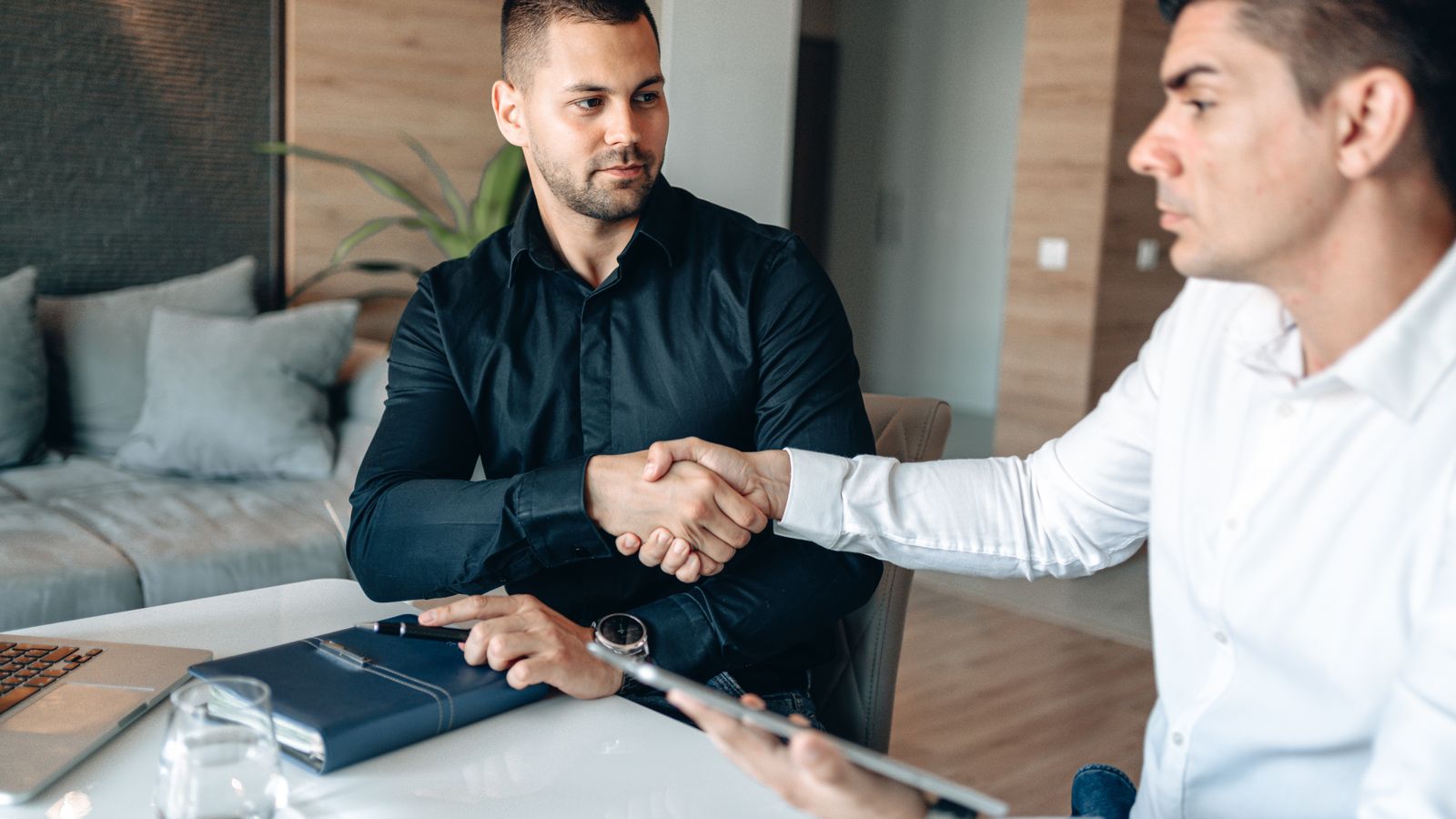 Small business owner reviewing marketing strategy with an agency partner