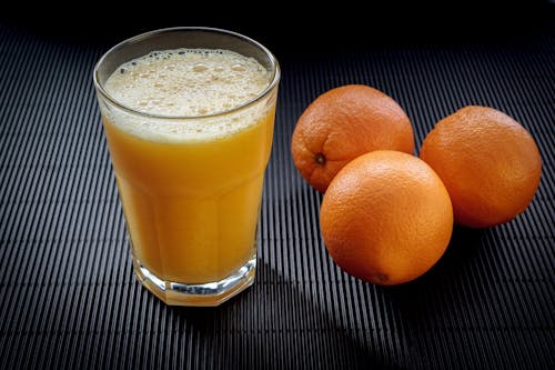 Gratis stockfoto met jus d'orange, oranje, sinaasappels