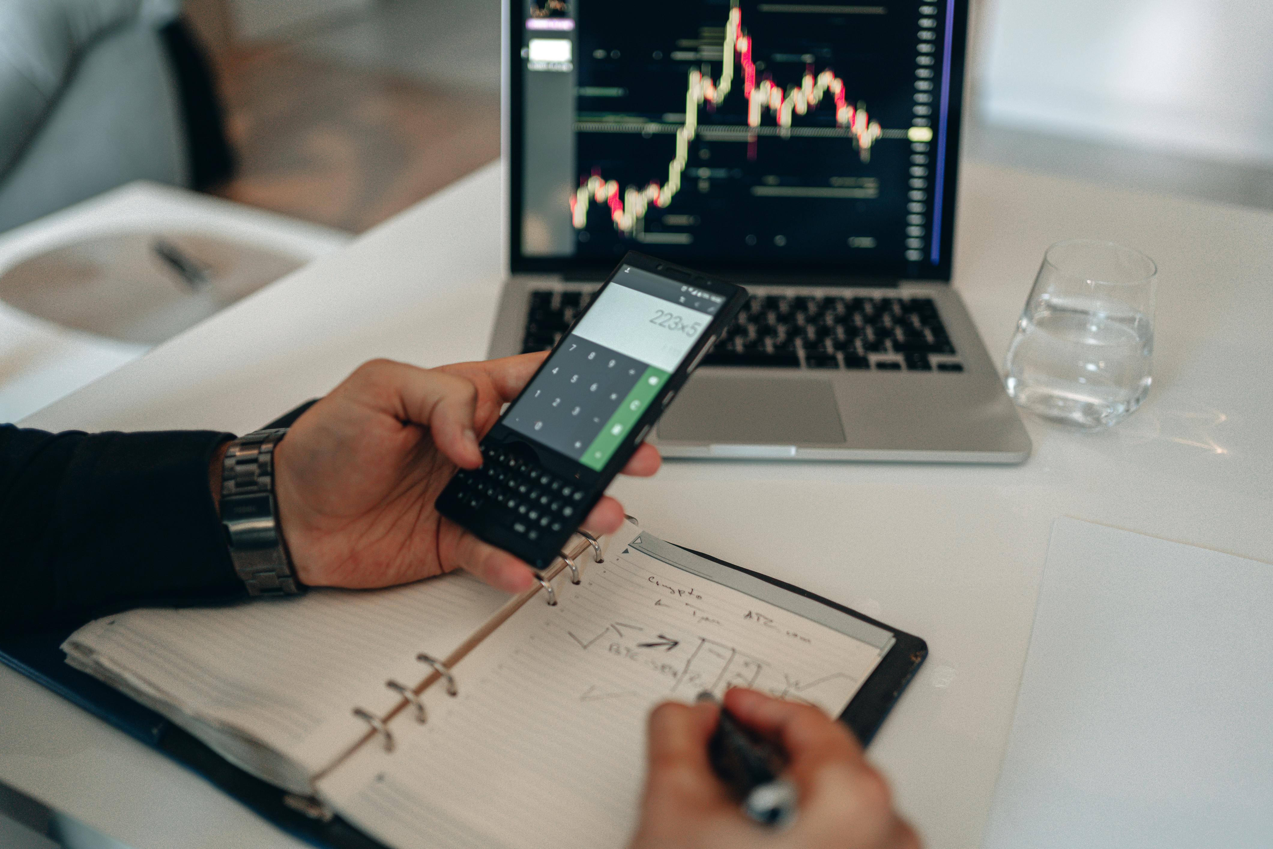 a person using the calculator on a phone