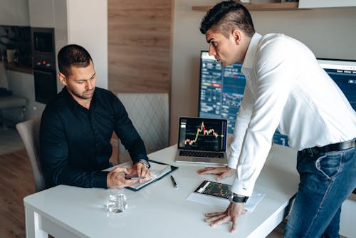 Men Discussing Business Strategy