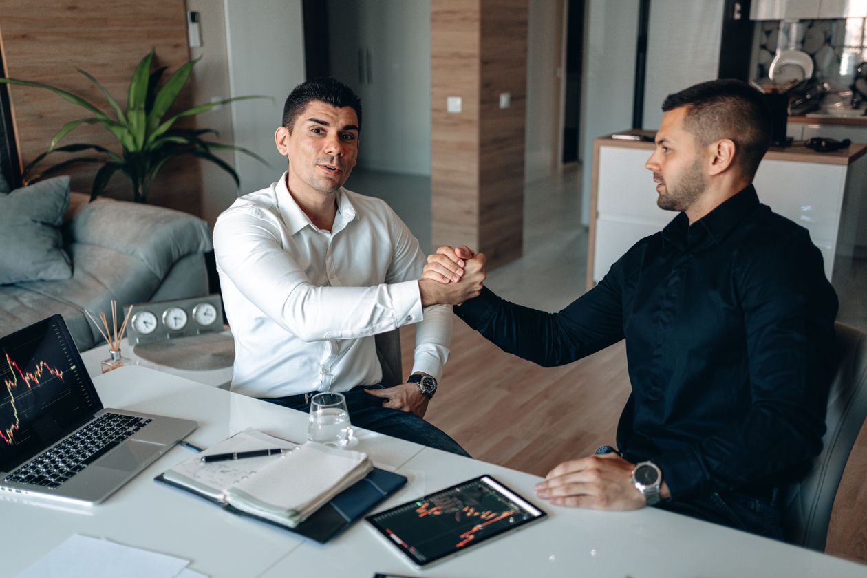 Agency owner closing an AI receptionist deal with a plumbing business owner