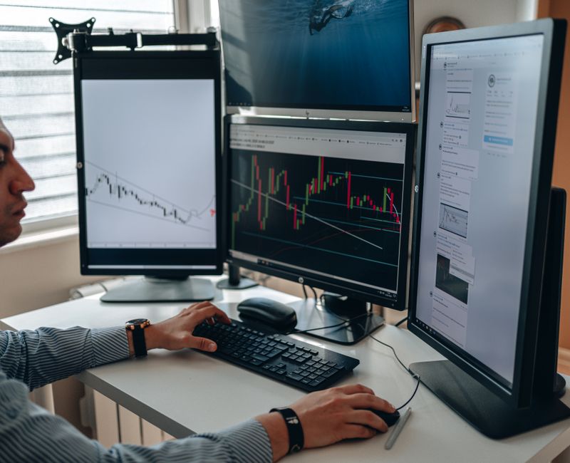A trader analyzing historical data on a computer screen