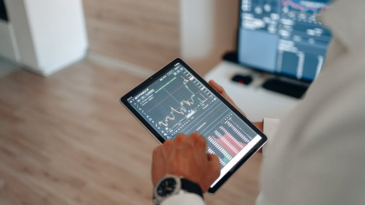 Close-up Person Using A Tablet