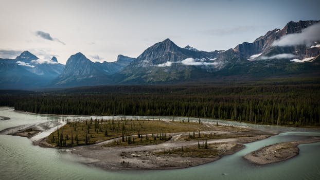 Breathtaking landscape of mountains and a river in Jasper National Park, Alberta.