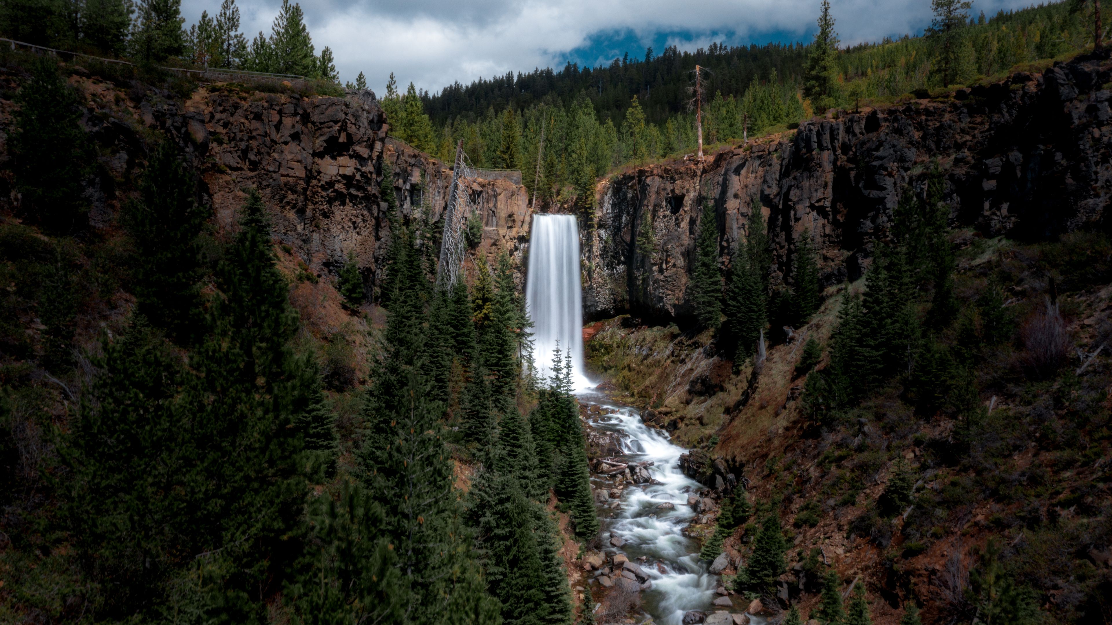 Bend: Tumalo Falls surrounded by forest near Bend