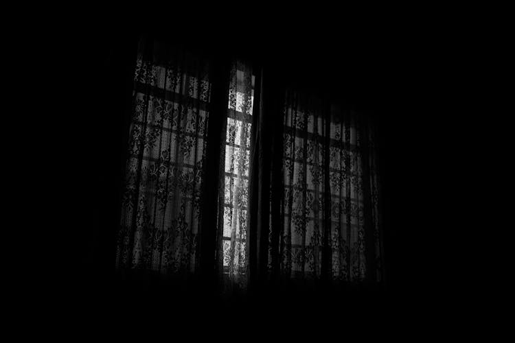 Dark Room With Closed Curtains