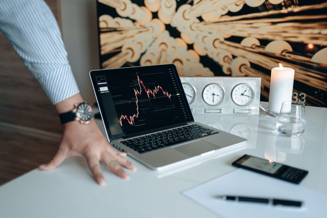 Person Using Macbook Pro On White Table Free Stock Photo Person using macbook pro on white table free stock photo
