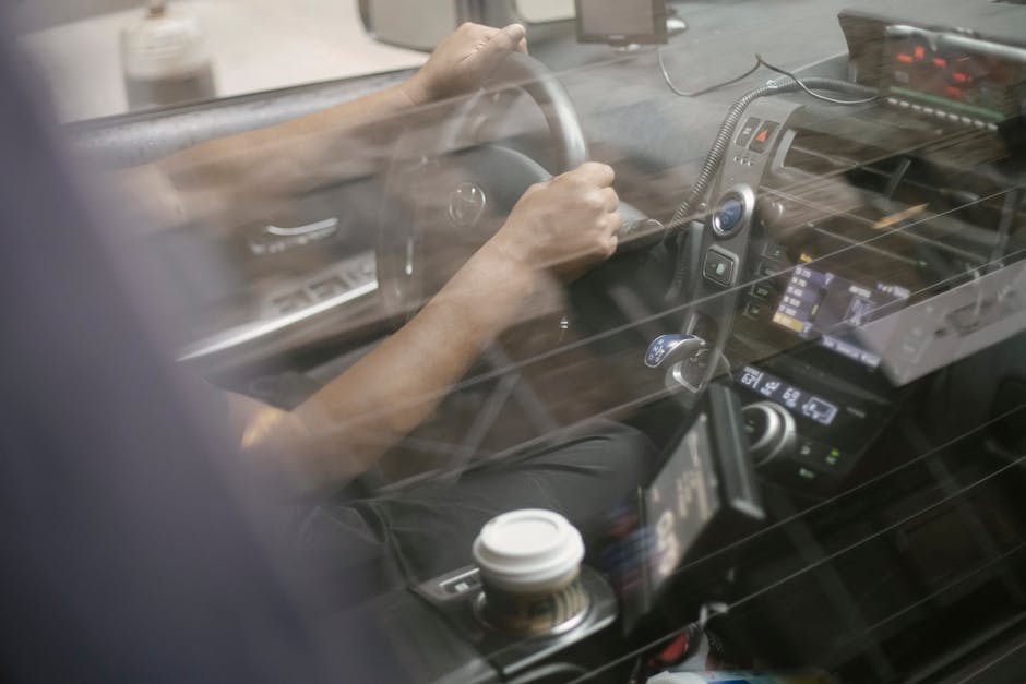 Man driving automobile with convenient dashboard