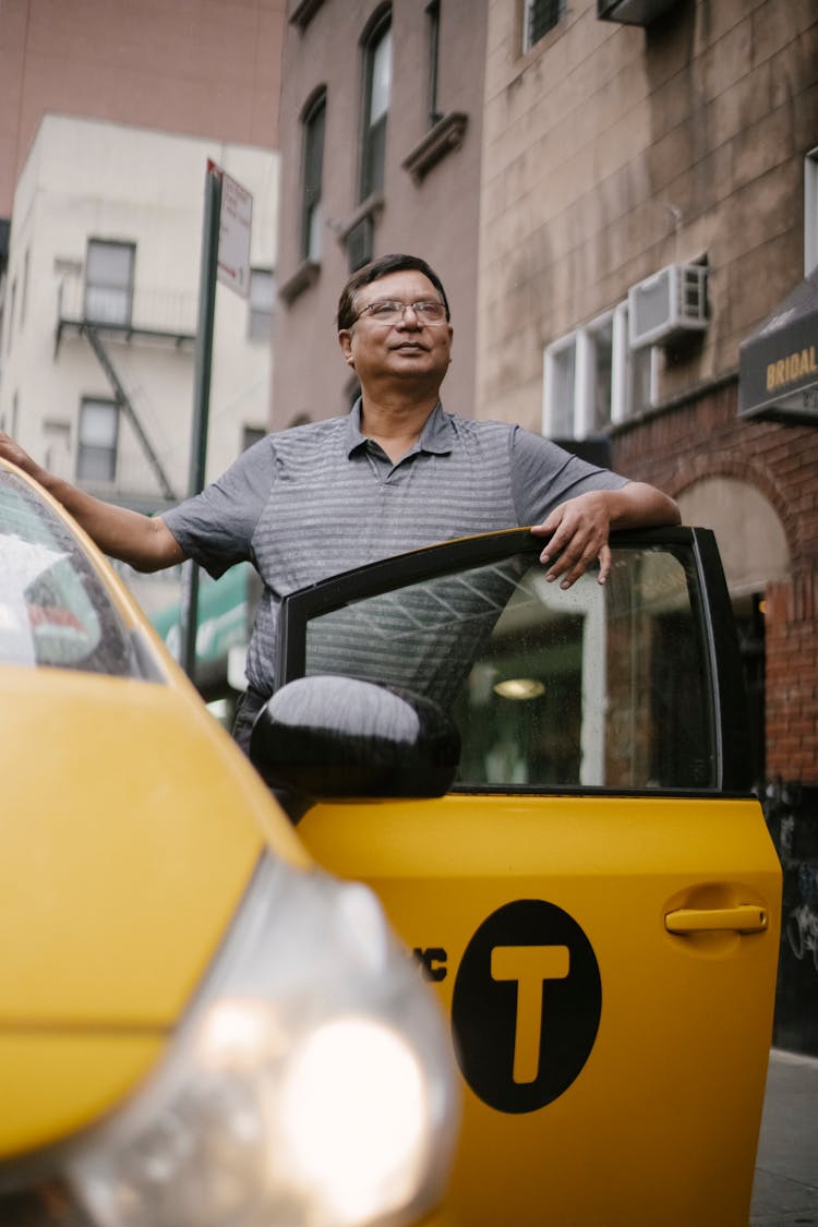 Happy Driver Standing Near Car