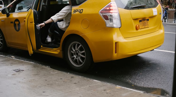 Crop Person Closing Taxi Door