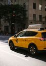 Taxi car on road in city