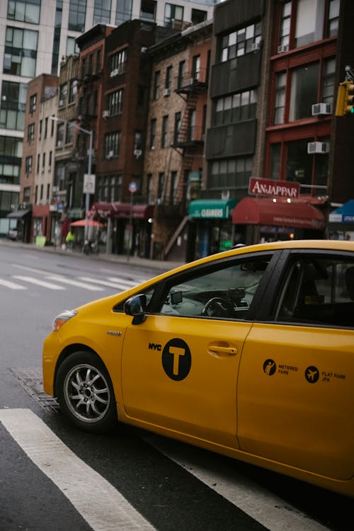 Taxi car on street in town