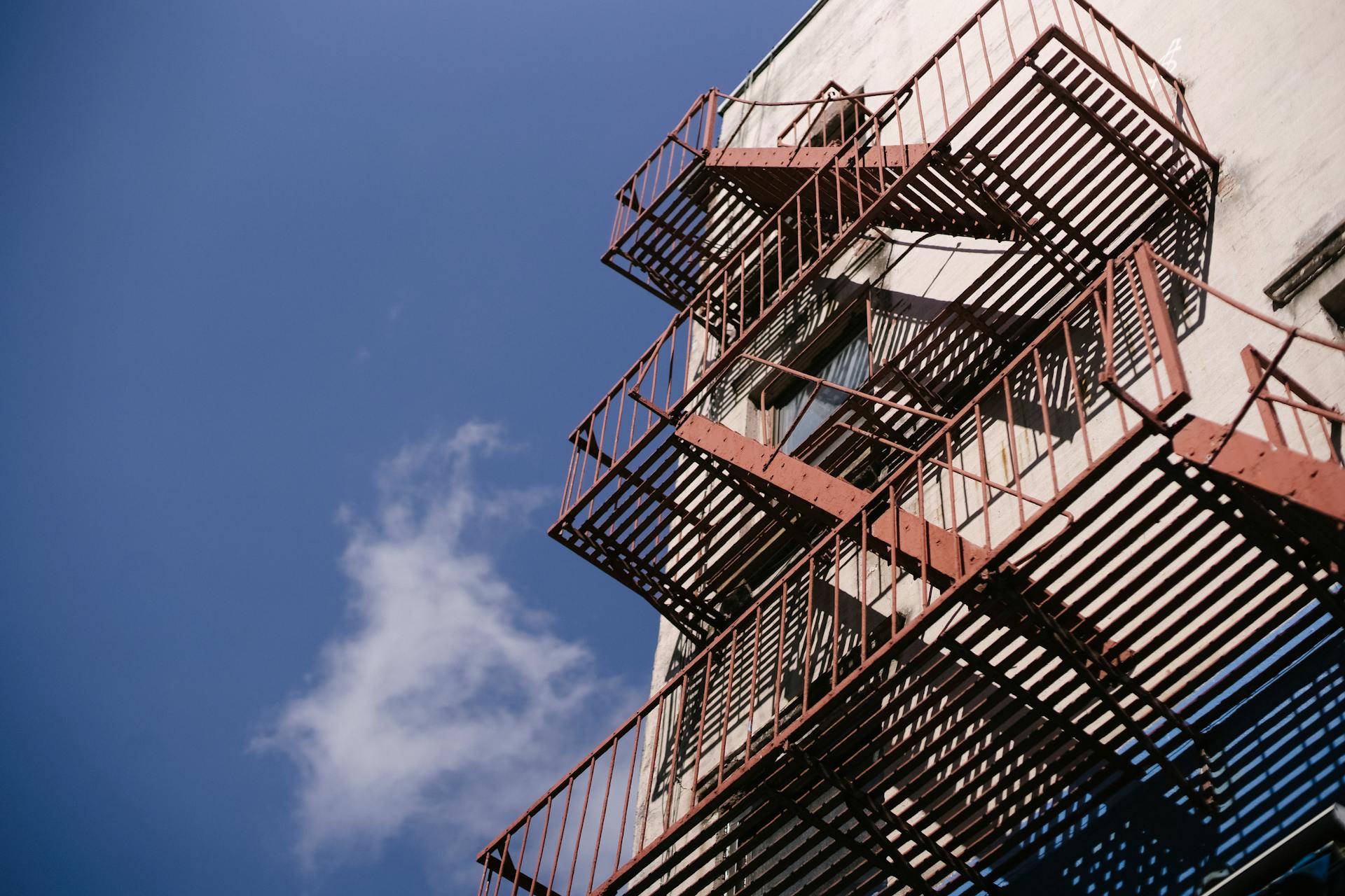 Tall staircase with railings of concrete building